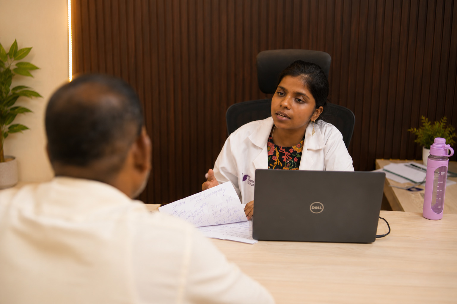 A nutrition consultation between a dietitian and a student at Longer Life Wellness